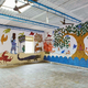 Image for article titled Japanese artists create stunning mud paintings on this Indian school’s walls—then wipe them off